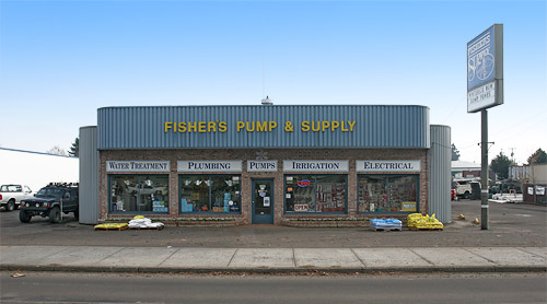 The Fisher's Supply storefront on SW 1st Ave in Canby, Oregon in daylight